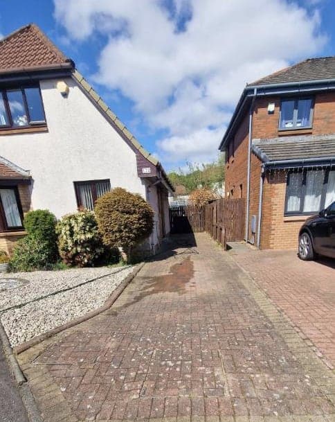 Red block driveway and side path, before cleaning
