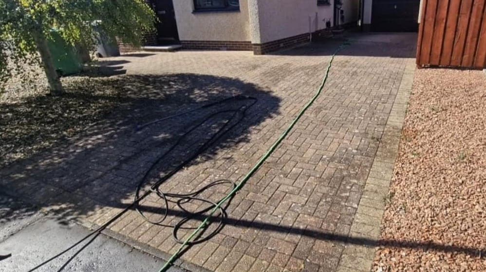 Driveway part way through, cleaned by Steam King