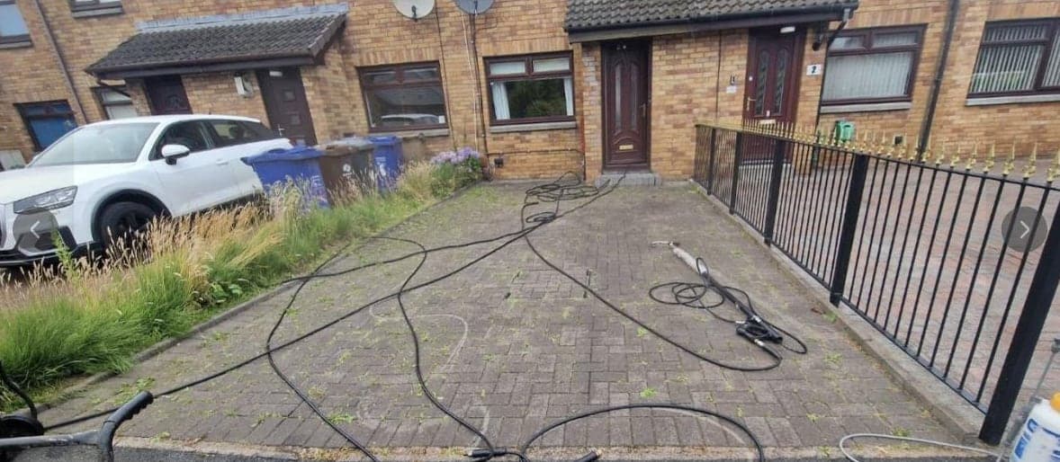Shared parking area, cleaned by Steam King